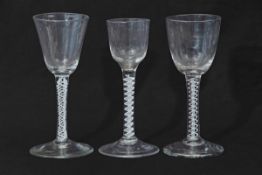 Three 18th century air twist wine glasses (3)