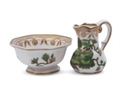 Spode miniature hydra jug with matching basin, the pieces with a green floral design within gilt