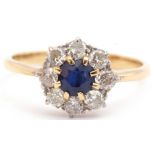 Sapphire and diamond cluster ring, the round cut faceted sapphire 5mm diam, multi-claw set and