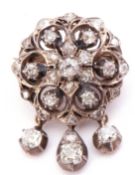 Victorian diamond cluster triple drop brooch/pendant, the circular pierced design with three
