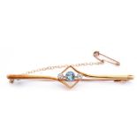 Aquamarine and diamond set bar brooch, the centre an offset square frame featuring a round faceted