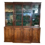 19th century mahogany break front library bookcase, moulded cornice over astragal glazed doors