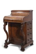 Victorian walnut piano top Davenport, the back fitted with a rising stationery compartment with