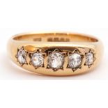 18ct gold five stone diamond ring with five graduated old cut diamonds, each individually in a