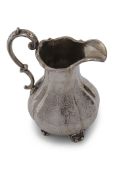 Victorian melon shaped milk jug engraved with vacant cartouches, scrolls and foliate designs, on