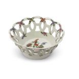 Small 18th century Worcester basket with pierced sides and floral decoration in Chelsea style to the