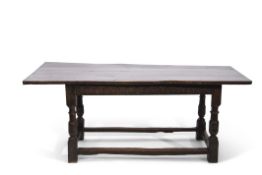 17th century and later oak refectory table, the later top raised on ring turned and balustered