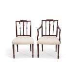 Set of 4 Hepplewhite style mahogany dining chairs comprising one carver and three single chairs, all