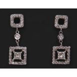 Pair of diamond cluster pendant earrings, each set with a Princess cut diamond, 0.86ct total, colour