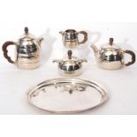 Belgian Arts & Crafts planished silver beehive form tea and coffee service with matching tray,