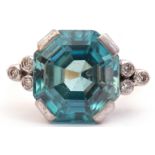 Mid 20th century zircon and diamond dress ring, the octagonal zircon bar claw set with each shoulder