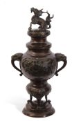 A late 19c Oriental Bronze censor the baluster body decorated applied with flying cranes