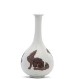 Small Chinese porcelain bottle vase with decoration of dragons and a rat, 15cm high