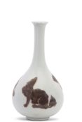 Small Chinese porcelain bottle vase with decoration of dragons and a rat, 15cm high