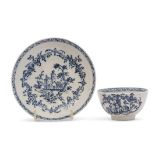 Lowestoft porcelain tea bowl and saucer decorated with an underglaze blue print of The Good Cross