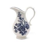 Lowestoft porcelain milk jug decorated in underglaze blue with a floral print, 14cm high