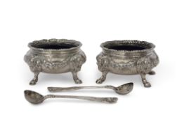 Fine heavy pair of William IV circular salts having wavy gadrooned rim, applied floral and foliate