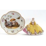 A 19th century Meissen lobed saucer, decorated with chickens and a turkey in landscape setting,