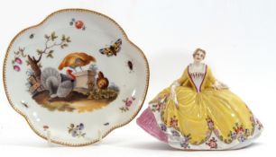 A 19th century Meissen lobed saucer, decorated with chickens and a turkey in landscape setting,