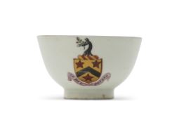 Rare Lowestoft tea bowl made for the Rev Robert Potter, the front with armorial with inscription "In