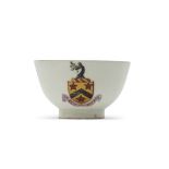 Rare Lowestoft tea bowl made for the Rev Robert Potter, the front with armorial with inscription "In