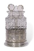 Silver cased three bottle decanter set, glass bottles and stoppers in excellent condition, James &