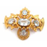 Victorian gold foil work brooch in rococo style with foliate engraved decoration and featuring