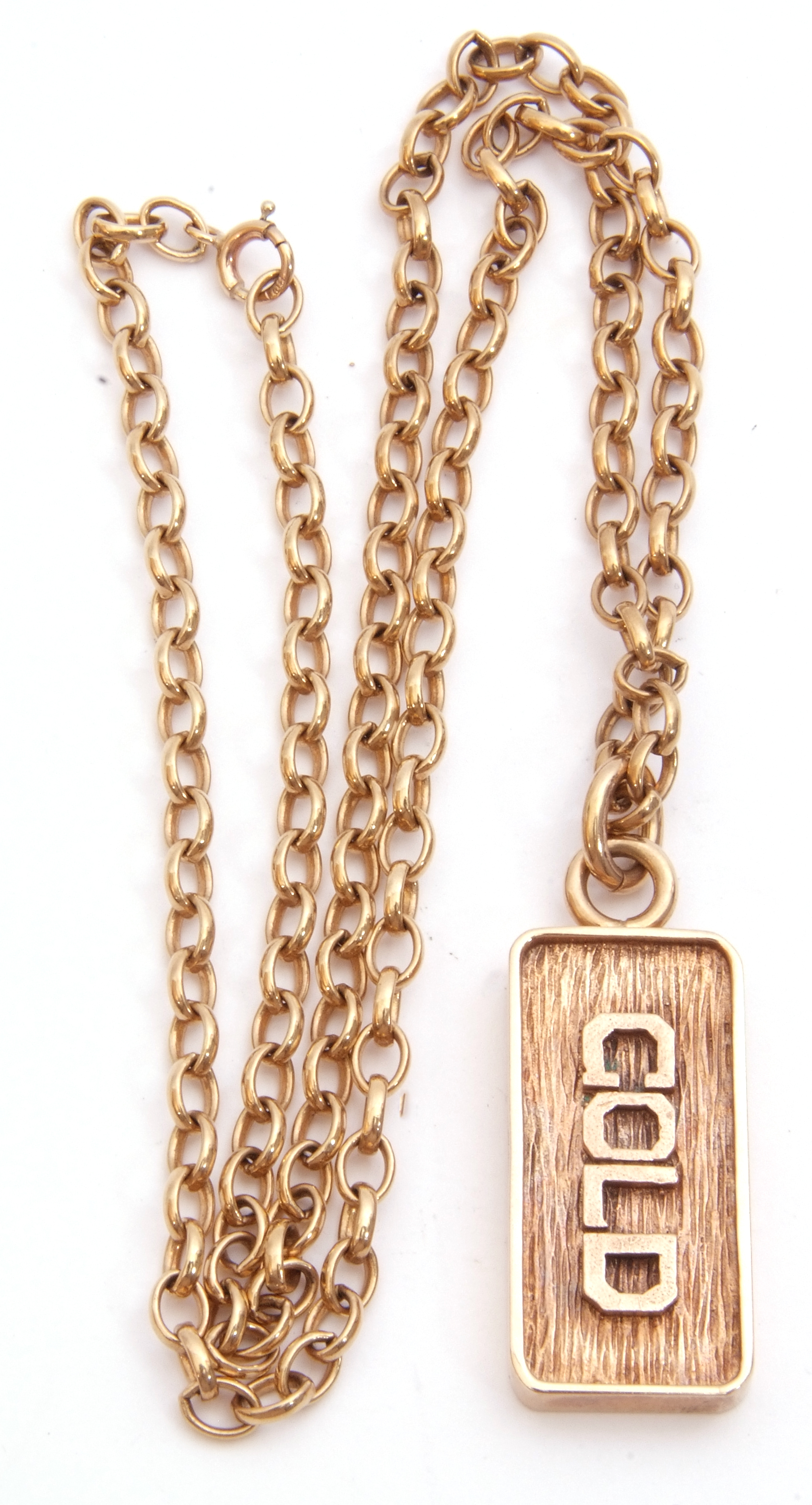 Late 20th century gold ingot pendant with raised lettering "GOLD" to an engraved bark ground, - Image 5 of 5