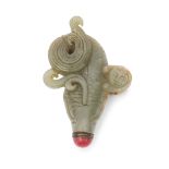 Chinese jade flask modelled with a boy on a carp with red button stopper, 11cm long