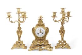 19th century French ormolu clock set in rococo taste, the clock with pierced gilt hands to a white