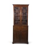 Mahogany secretaire bookcase, glazed top enclosing fitted shelving over a full width secretaire