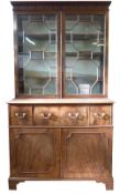 George III period mahogany secretaire cabinet, dentil and blind fretwork moulded cornice over two