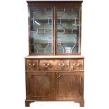 George III period mahogany secretaire cabinet, dentil and blind fretwork moulded cornice over two