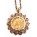 Victorian gold shield back sovereign within a hallmarked 9ct gold filigree leaf edge design pendant,