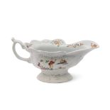 Small Worcester porcelain high footed sauce boat, circa 1755, the sides decorated in polychrome with