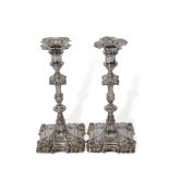 Fine pair of Georgian candlesticks, William & James Priest, London 1770, the coat of arms are