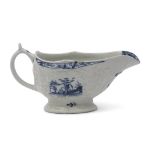 Small Lowestoft porcelain sauce boat with moulded decoration surrounding a cartouche with the little