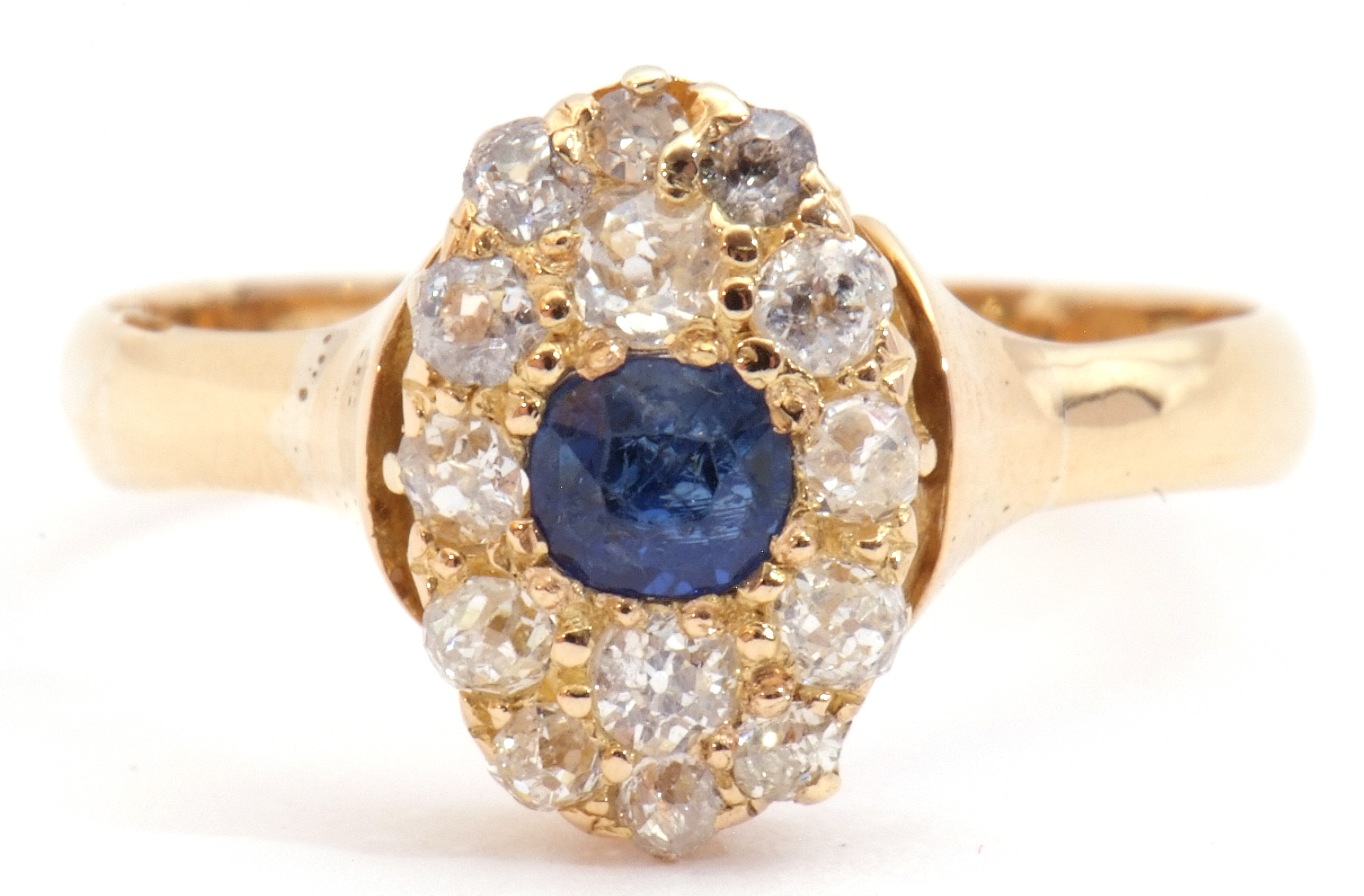 Sapphire and diamond cluster ring, the oval shaped design centring a round cut sapphire and 14 small - Image 8 of 8