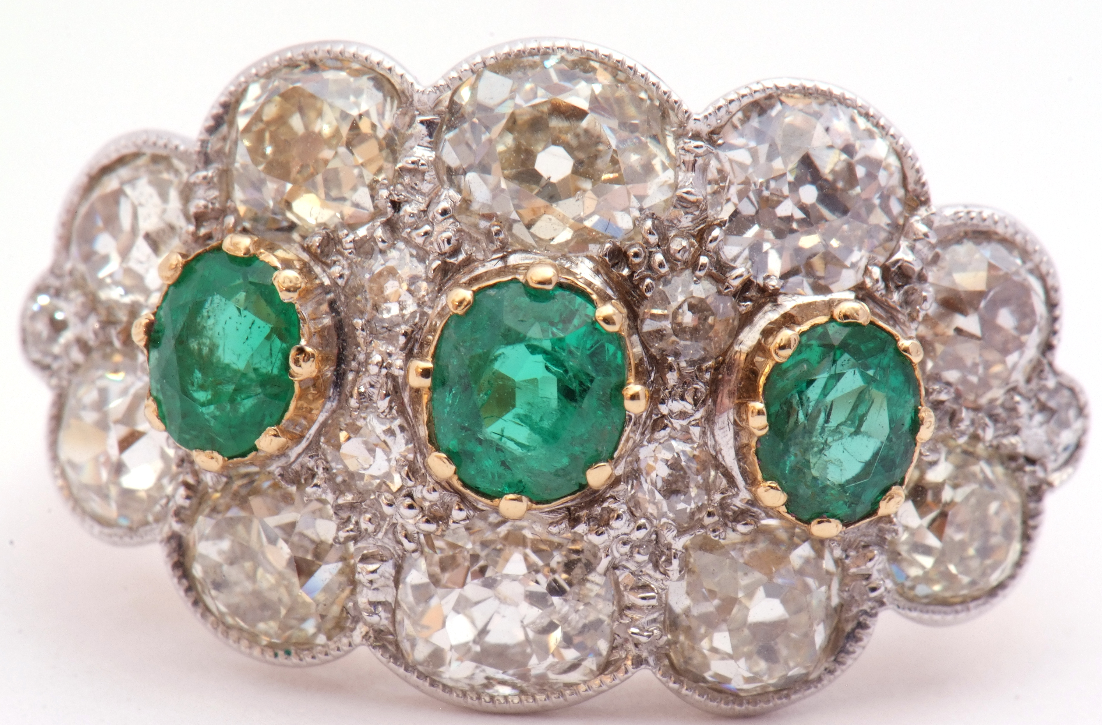 Large emerald and diamond cluster ring of oval design, featuring three graduated oval faceted - Image 5 of 9