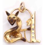 Yellow metal cat and mouse stylised pendant, each highlighted with small diamonds and sapphire set