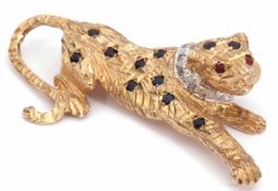 9ct gold, diamond and gem set panther brooch, the heavily textured naturalistic panther decorated