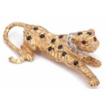 9ct gold, diamond and gem set panther brooch, the heavily textured naturalistic panther decorated