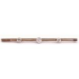 Late Victorian diamond set bar brooch comprising a double rectangular bar with engraved foliate