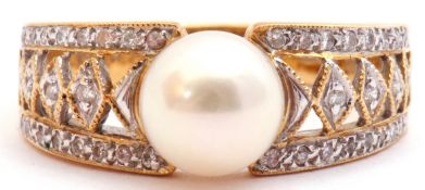 Pearl and diamond dress ring, the central collar set cultured pearl raised between pierced diamond