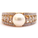 Pearl and diamond dress ring, the central collar set cultured pearl raised between pierced diamond