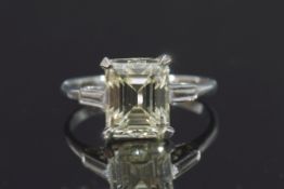Diamond single stone ring, the emerald cut diamond weighing 4.43ct, set in a four claw mount,