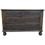 Oak large chest of rectangular form, two foliate moulded short drawers and two further full width