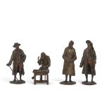 Group of four early 20th century Austrian miniature bronze figures including one of a teacher type