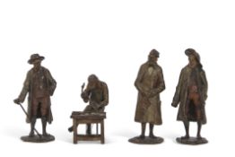 Group of four early 20th century Austrian miniature bronze figures including one of a teacher type