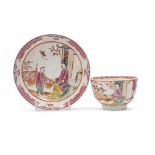 Lowestoft porcelain polychrome tea bowl and saucer with a chinoiserie design to centre within pink